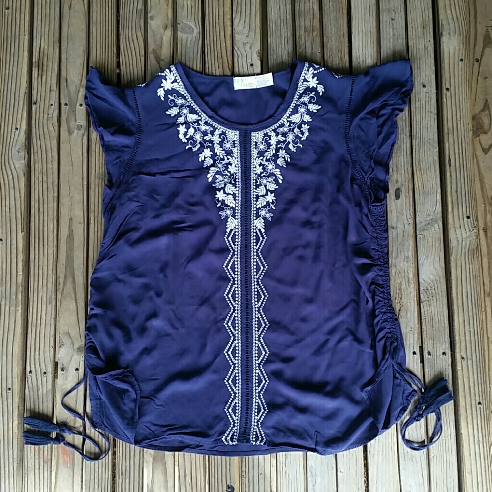 Unique Navy blouse with side ruching & tassels